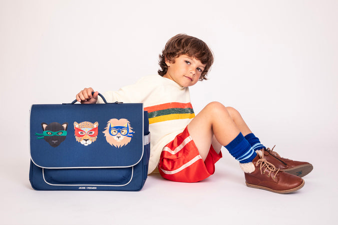 Boy wearing Jeune Premier It Bag Midi Supercats school bag, age 6 to 8