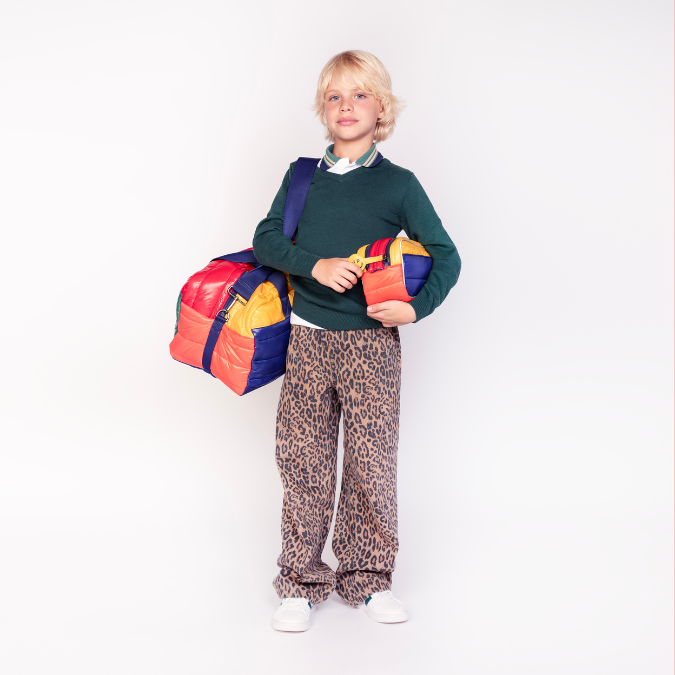 The Travel Pouch by Jeune Premier is a compact, stylish accessory with two zippers for easy organization. It’s the perfect travel companion!