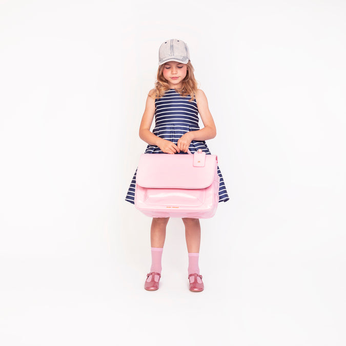 Girl wearing Jeune Premier It Bag Midi Blush school bag, age 6 to 8