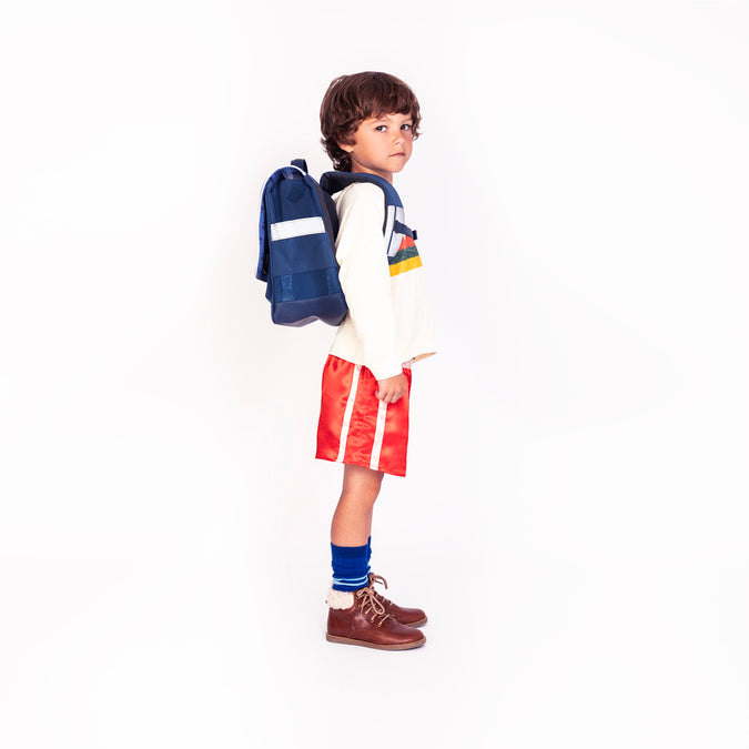 Boy wearing Jeune Premier It Bag Midi Supercats school bag, age 6 to 8