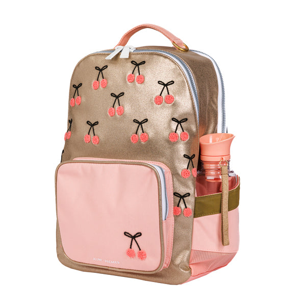 Trendy backpack for girls from 6 years. The New Bobbie Cherry Pompon is a rework of the classic Bobbie model. 