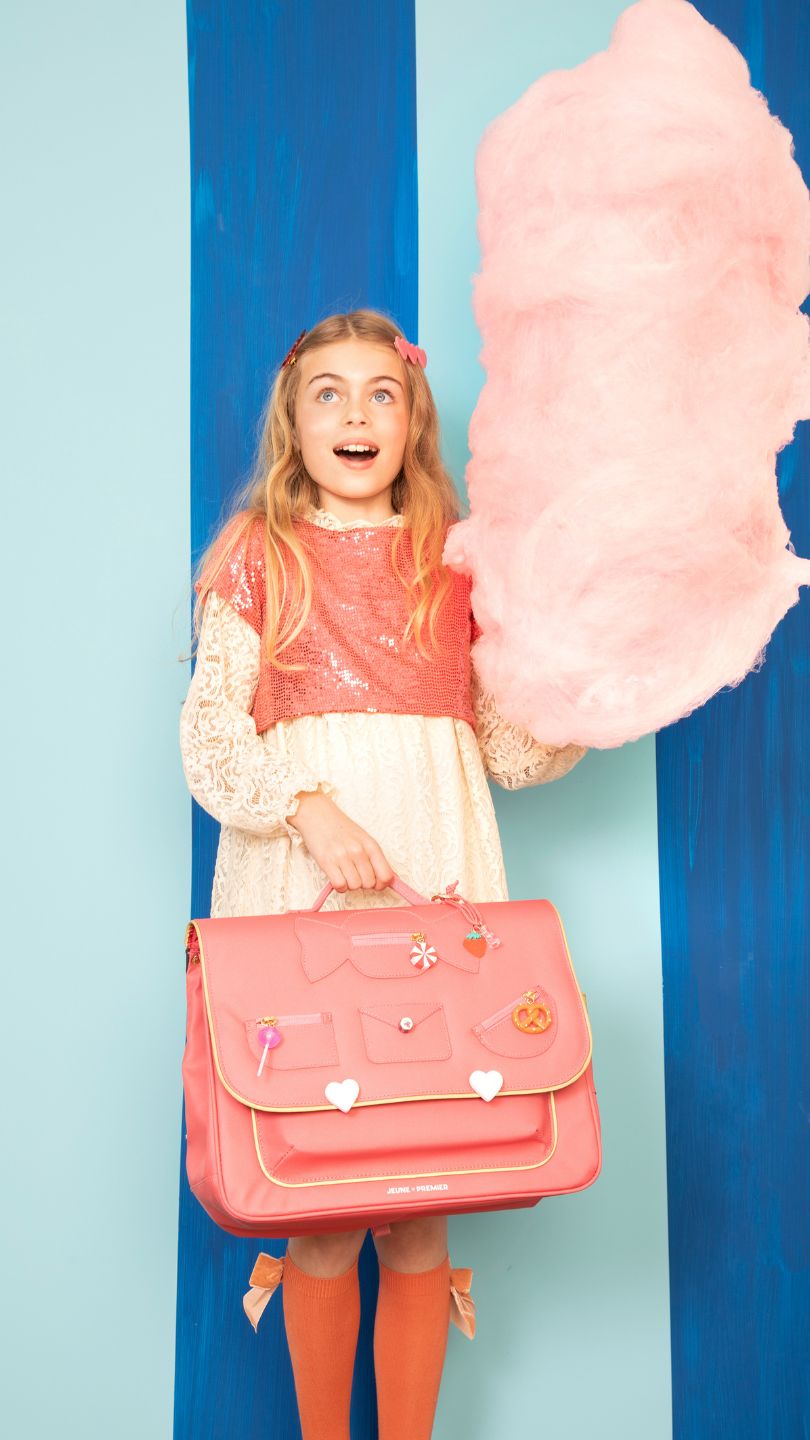 Young girl with Jeune Premier IT Bag Midi Candy - ergonomic school backpack with colorful candy print